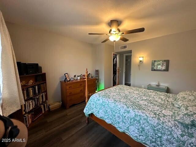 12679 W Lowden Rd, Peoria, AZ 85383 - bedroom with wood finished floors and ceiling fan