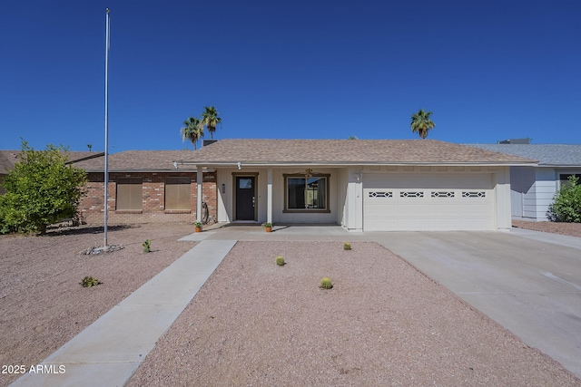 12234 S Pewaukee St, Phoenix, AZ 85044 - ranch-style home featuring a garage, driveway, covered porch, and brick siding