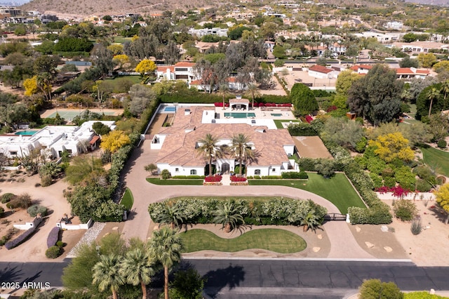 birds eye view of property featuring a mountain view and a residential view