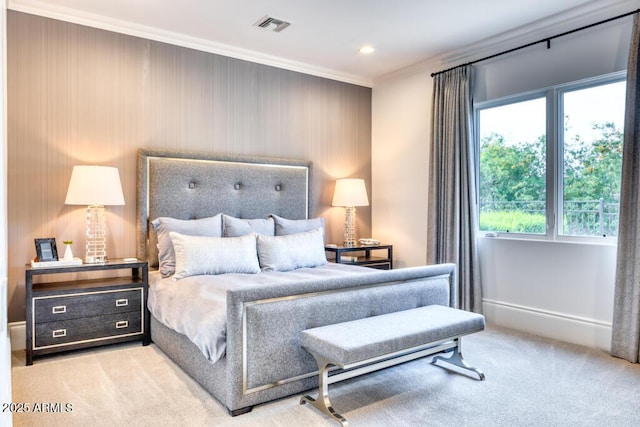 carpeted bedroom featuring crown molding, recessed lighting, and visible vents