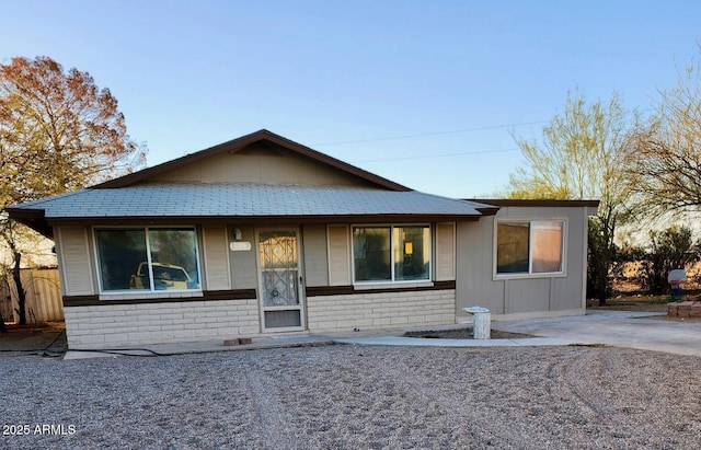 view of front of house with brick siding