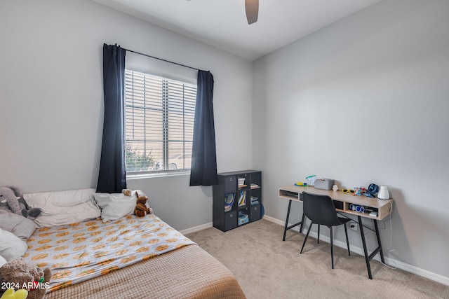 bedroom featuring ceiling fan and light colored carpet