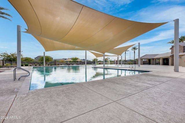 view of pool featuring a patio area