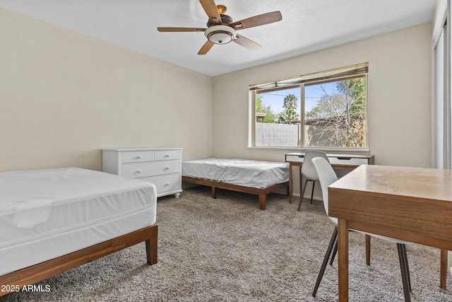 bedroom featuring carpet and ceiling fan