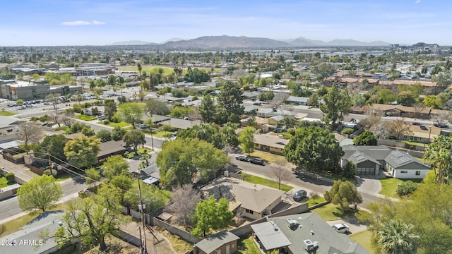 birds eye view of property with a residential view and a mountain view