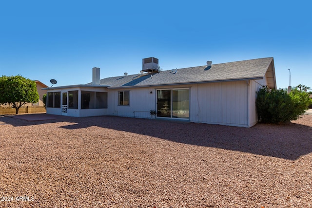 back of property with a patio area, central AC, and a sunroom