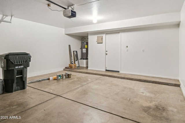 garage with a garage door opener and water heater