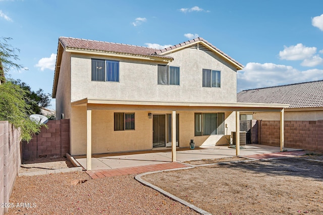 back of property featuring a patio area and central air condition unit