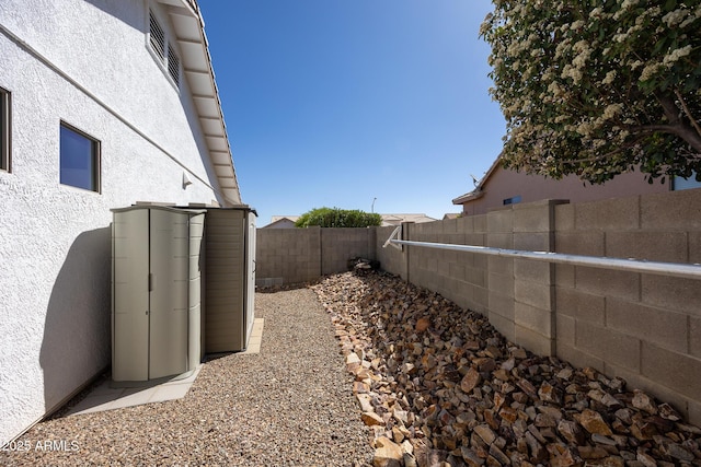 view of home's exterior with a fenced backyard and stucco siding