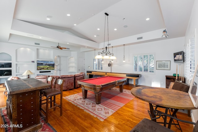 recreation room featuring ceiling fan, built in shelves, pool table, and wood-type flooring