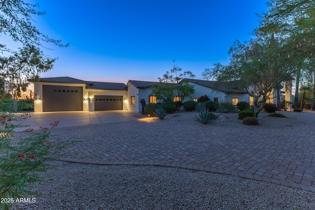 view of front of home featuring a garage