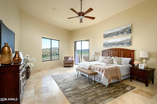 16569 E Trevino Dr, Fountain Hills, AZ 85268 - bedroom with access to outside, a ceiling fan, and a high ceiling