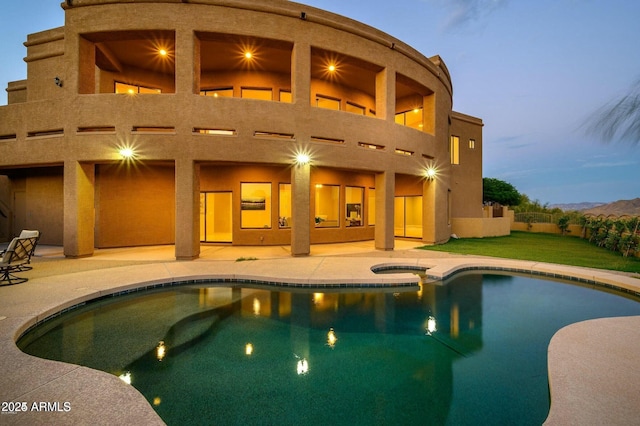 16569 E Trevino Dr, Fountain Hills, AZ 85268 - back of property featuring a balcony, a patio, and a pool with connected hot tub