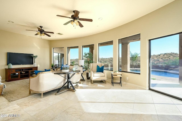 16569 E Trevino Dr, Fountain Hills, AZ 85268 - tiled living area featuring ceiling fan and recessed lighting