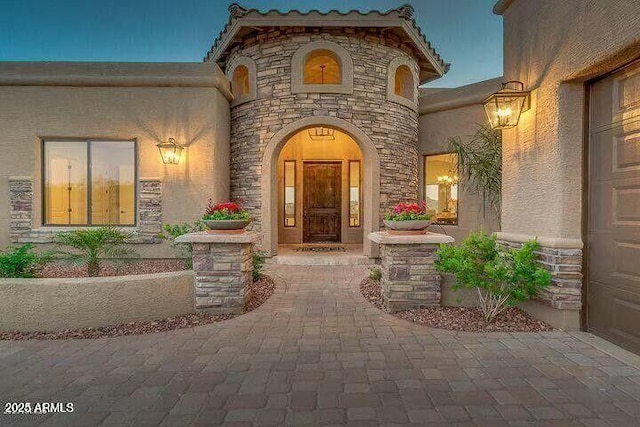 16569 E Trevino Dr, Fountain Hills, AZ 85268 - entrance to property with stone siding and stucco siding