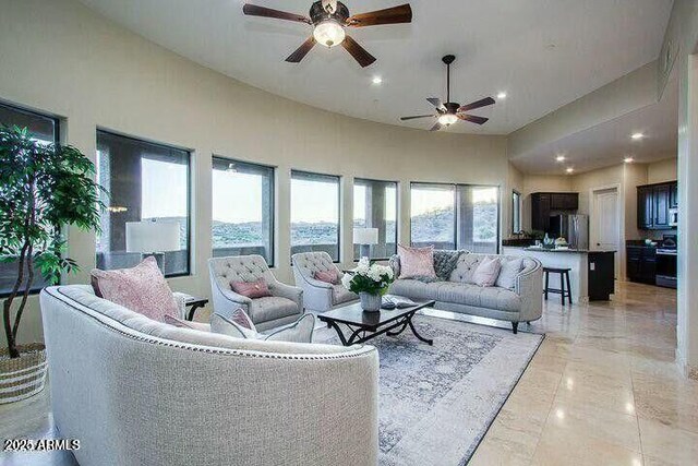 16569 E Trevino Dr, Fountain Hills, AZ 85268 - living room featuring a ceiling fan, recessed lighting, and light marble finish floors