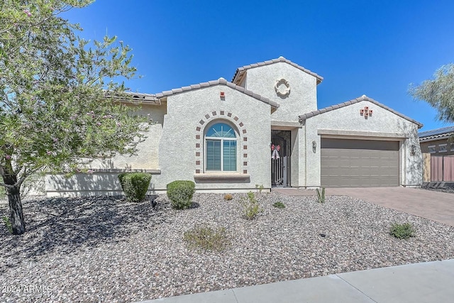 view of front of property with a garage