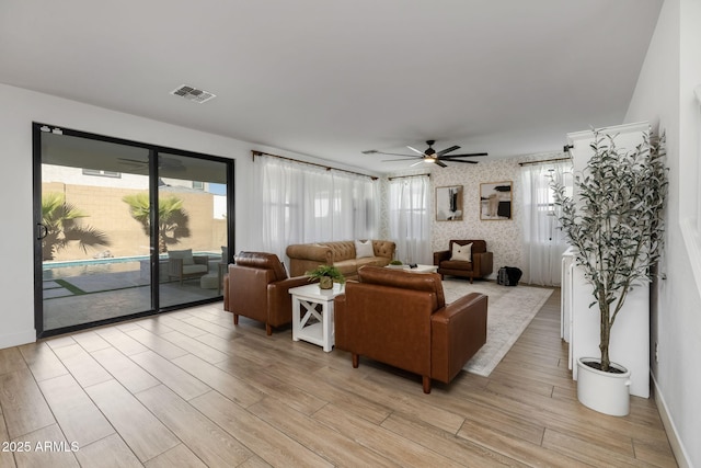 living room with ceiling fan