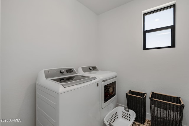 laundry area featuring washing machine and dryer