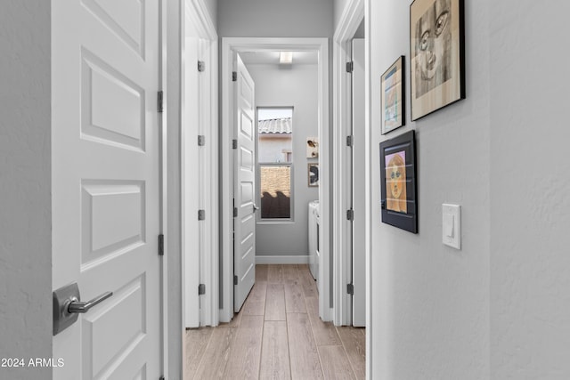 corridor featuring light hardwood / wood-style flooring