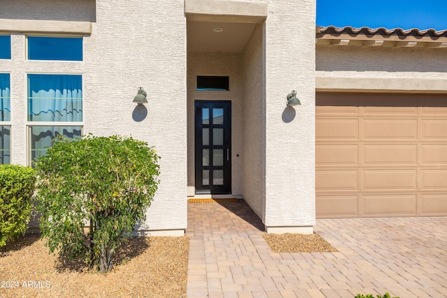 entrance to property with a garage