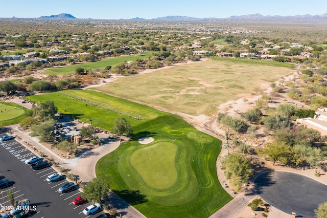 birds eye view of property featuring a mountain view