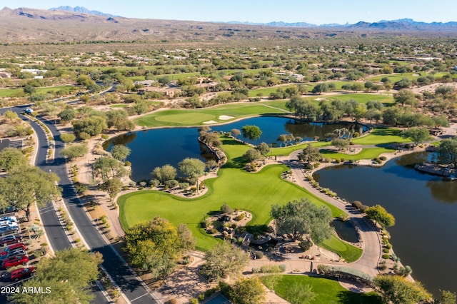 bird's eye view with a water and mountain view