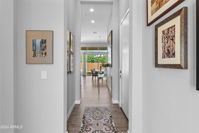 hallway featuring hardwood / wood-style flooring