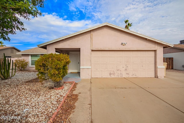 ranch-style home with a garage