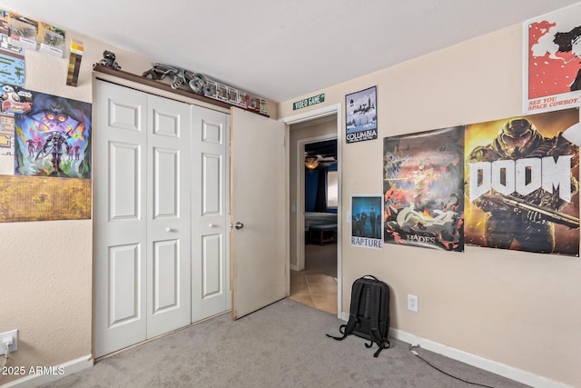 bedroom with carpet flooring and a closet