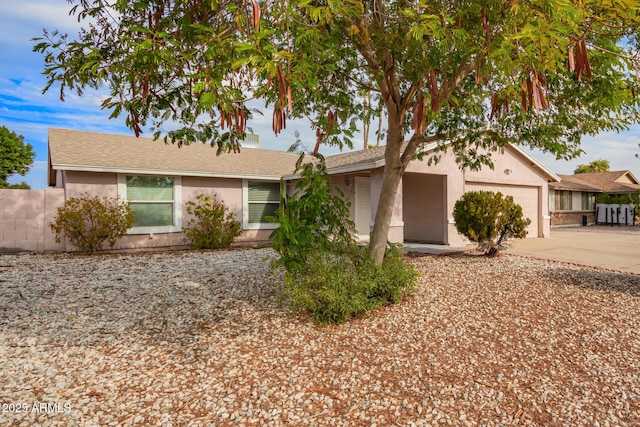 single story home with a garage