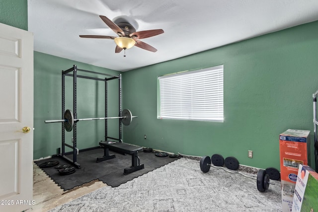 exercise area featuring ceiling fan