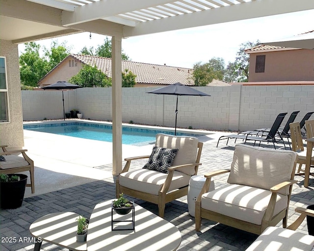 view of pool featuring a patio and a pergola