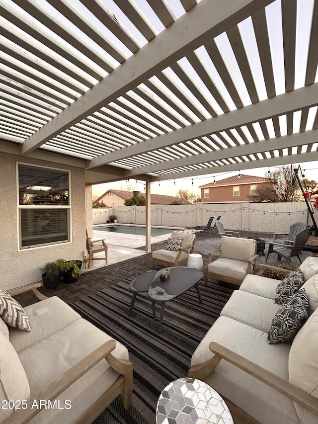 view of patio / terrace with an outdoor living space, a pergola, and a fenced in pool