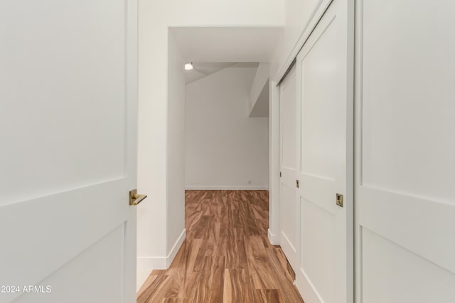 hall with light wood-type flooring