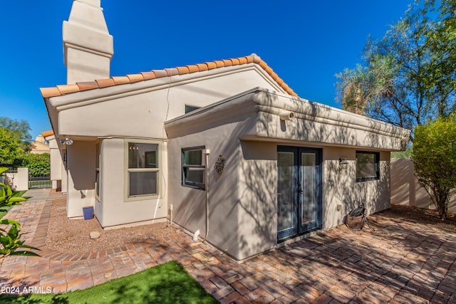 back of house featuring a patio