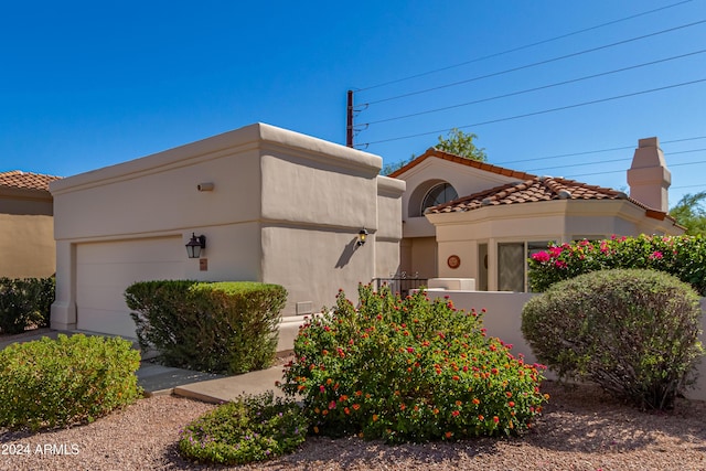 view of front of house with a garage