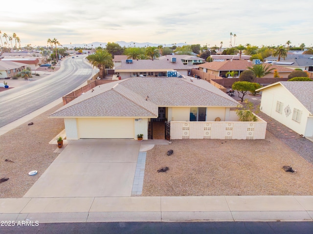 view of front of property with a garage