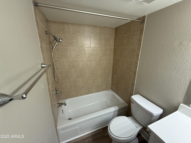 3434 W Danbury Dr Unit A206, Phoenix, AZ 85053 - bathroom featuring bathing tub / shower combination, vanity, wood finished floors, and a textured wall