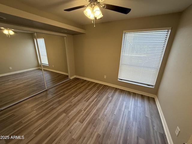 3434 W Danbury Dr Unit A206, Phoenix, AZ 85053 - empty room featuring a ceiling fan and wood finished floors
