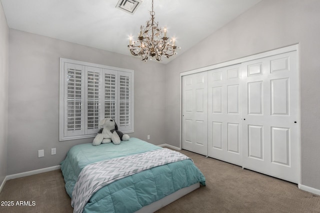 bedroom featuring carpet, visible vents, baseboards, vaulted ceiling, and a closet