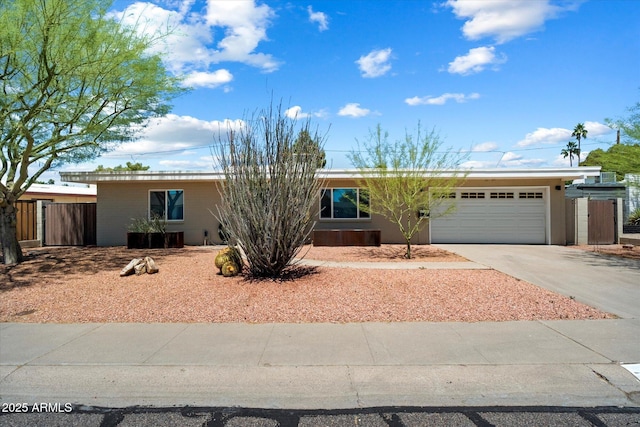 3814 E Poinsettia Dr, Phoenix, AZ 85028 - ranch-style house featuring an attached garage and driveway