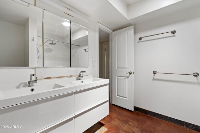 3814 E Poinsettia Dr, Phoenix, AZ 85028 - bathroom with double vanity, concrete flooring, a shower, and baseboards