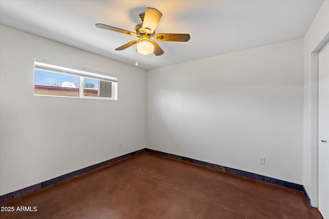 3814 E Poinsettia Dr, Phoenix, AZ 85028 - unfurnished room with concrete flooring, baseboards, and ceiling fan