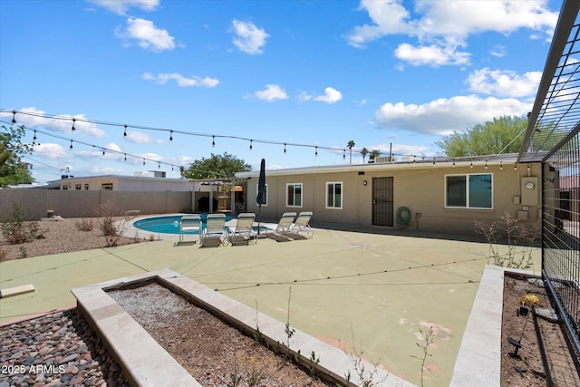 3814 E Poinsettia Dr, Phoenix, AZ 85028 - back of house with a fenced backyard and a patio area