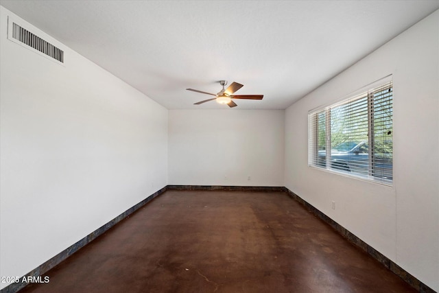 3814 E Poinsettia Dr, Phoenix, AZ 85028 - unfurnished room with concrete floors, ceiling fan, and baseboards