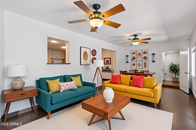 3814 E Poinsettia Dr, Phoenix, AZ 85028 - living room featuring ceiling fan and baseboards