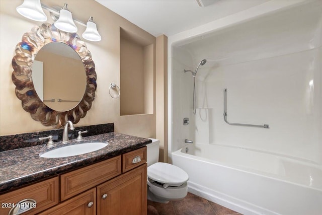 full bathroom featuring toilet, vanity, and bathing tub / shower combination