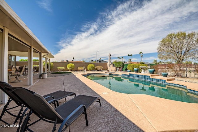 view of pool with a fenced backyard, a fenced in pool, and a patio