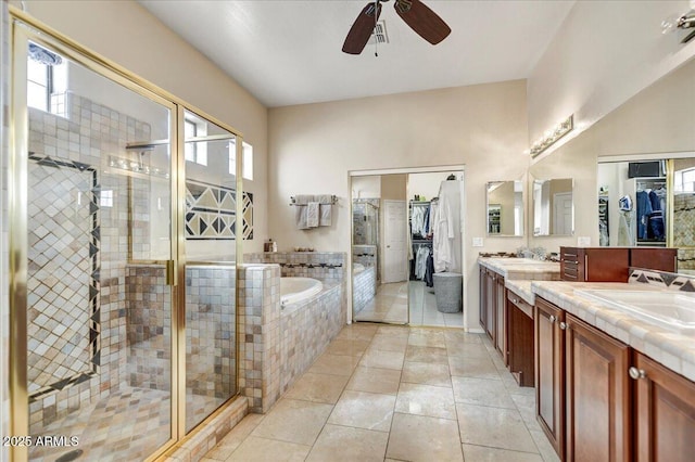 34014 N 43rd St, Cave Creek, AZ 85331 - full bath with a ceiling fan, vanity, a walk in closet, a bath, and a stall shower
